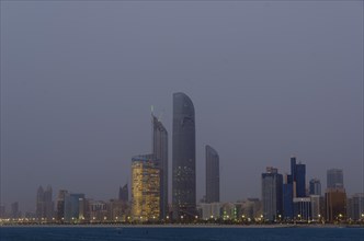 The skyline of Abu-Dhabi at dusk