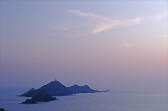 Les Iles Sanguinaires in the mediterranean sea at the blue hour after sunset seen from Tour de la Parata. Les Iles Sanguinaires are in the department Corse-du-Sud