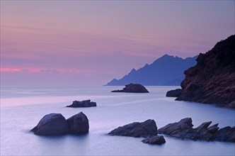 The Gulf of Porto with the surrounding mountains at sunset