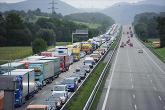 Traffic jam after a massive traffic accident on the A8 motorway where a truck crushed a car