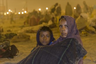 Woman and child at Kumbha Mela grounds