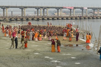 Sitting in silence as part of the initiation of new sadhus at the Sangam