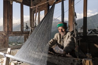 Local man weaving with a handloom