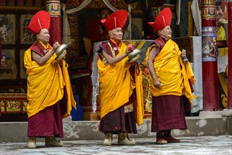 Monks making music as part of the opening ceremony of the Hemis Festival