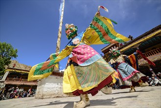 Monks performing ritual mask dance