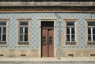 House with a typical tiled facade