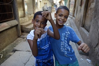 Two boys in a slum or favela