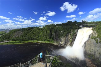 Tourist on viewing platform at Montmorency Falls