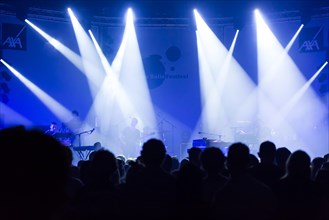 Spotlights and stage during the concert of the British band Hot Chip