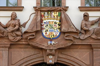Heritage-protected crest on the District Court building