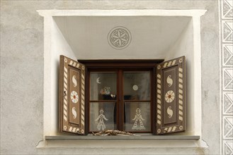 Window of an Engadin house decorated with Sgraffito