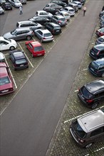 Car park with many parked cars