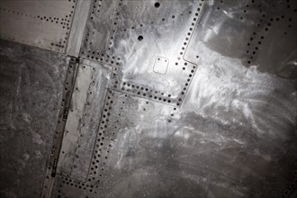 Rivets and screws in the outer skin of an aircraft from the 60s