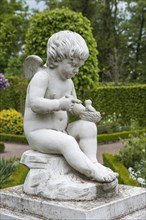 Amor statue in the Russian garden of Schloss Belvedere Palace