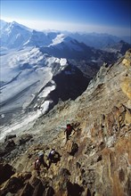 Mountaineers ascending on the Matterhorn normal route at Hoernli Ridge