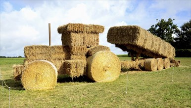 Tractor and trailer made of straw bales