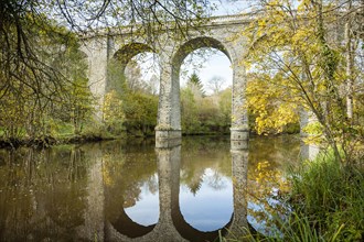 Viaduct at Glénic in late autum reflected in Creuse river