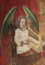 Angel playing an organ