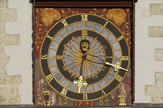 Turret clock with a painted clock face