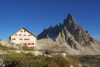 Dreizinnenhuette or Three Peaks Alpine hut in front of Paternkofel Mountain