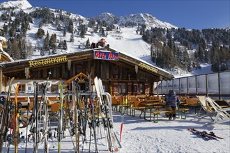 Alte Alm Restaurant at the Obertauern skiing region with mountains Gamskarlspitz and Gurpitsch Eck