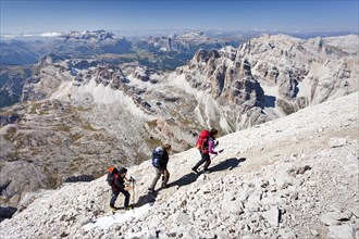 Mountain climbers during the ascent of Mt Tofana di Roze on the Via Ferrata Giovanni Lipella