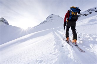 Cross country skier ascending Ellesspitze Mountain