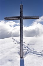 Summit cross of Schwarzhorn Mountain on Jochgrimm