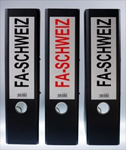Three file folders labeled "FA-Schweiz"
