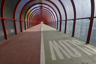 Covered pedestrian and cyclist bridge