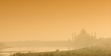Taj Mahal and Yamuna river in the evening light