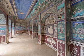 Wall paintings or frescoes painted with natural colours from the Bundikalam school of painting