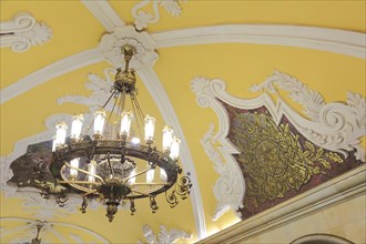 Stucco ceiling with a chandelier