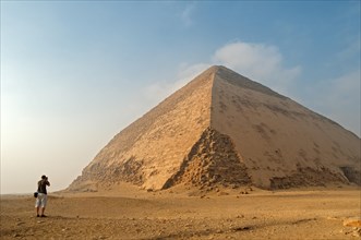 Tourist takes pictures of Sneferu's Bent Pyramid
