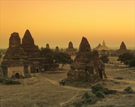 Field with ruins of Buddhist pagodas and temples
