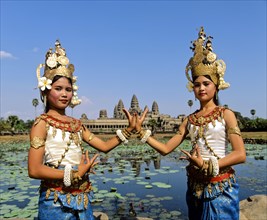 Temple dancers or apsaras at the Lotus Pond in front of the temple of Angkor Wat