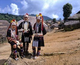 Three Akha girls in a mountain village