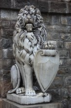 Lion with coat of arms