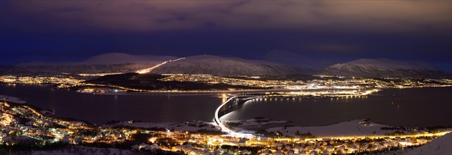Bridge over fjord at night