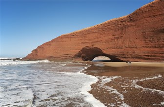 Rock bridge on the beach of Legzira on the Atlantic Ocean