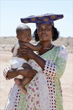 Herero woman with baby