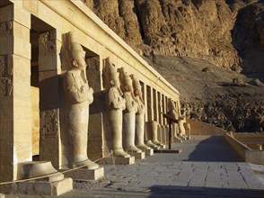 Facade with columns and Osiris statues at the Temple of Hatshepsut