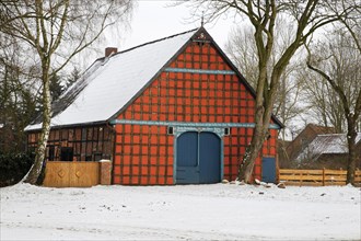 Typical historic Lower Saxon half-timbered house at rundling village of Satemin
