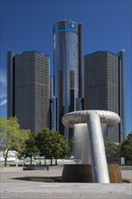 General Motors headquarters and the Detroit Marriott Hotel in the Renaissance Center with the Noguchi Fountain in Hart Plaza in the foreground