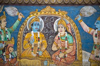 The god Shiva and the Mother Goddess Ganga painted on the wall of a house on the banks of the Ganges River