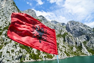 Albanian flag on the Koman water reservoir