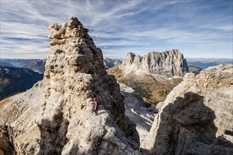 Mountaineers during the ascent of the Piz Selva on the Possnecker vai ferrata in the Sella group at Sella Pass