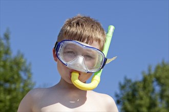 Boy with diving mask and snorkel