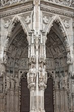 Gothic entrance portal with relief figures