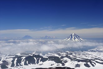 View from the Gorely volcano to the Tolmachev Dol and Opala volcanoes
